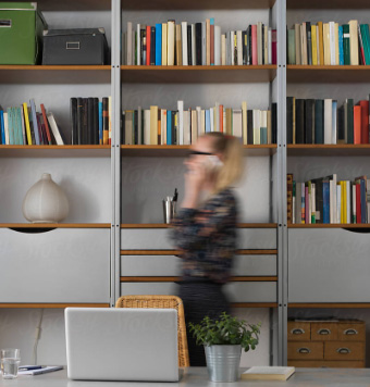 woman on her cell phone in an office
